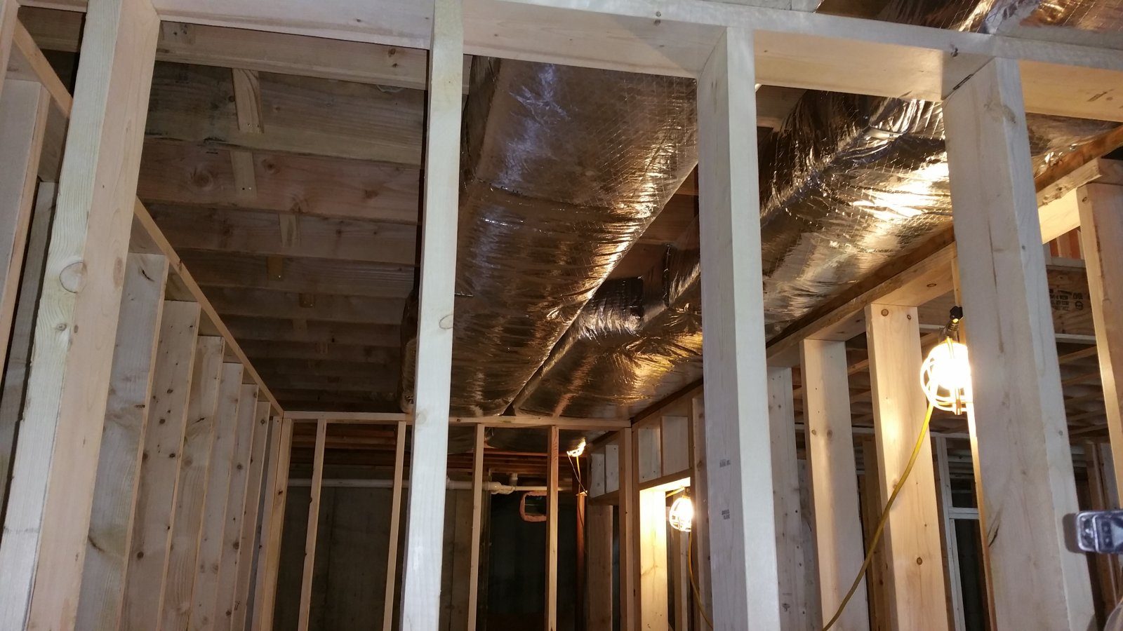 Sealed and insulated duct installation on a new construction project
